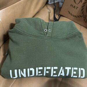 Mens slightly used Olive green Undefeated hoodie Size L